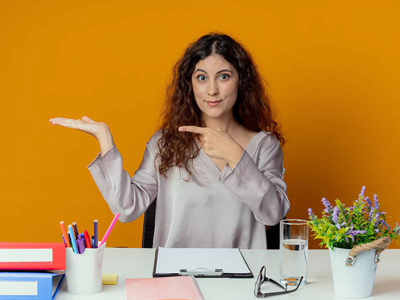 Image showing a student pointing, symbolizing the importance of asking for help in online classes